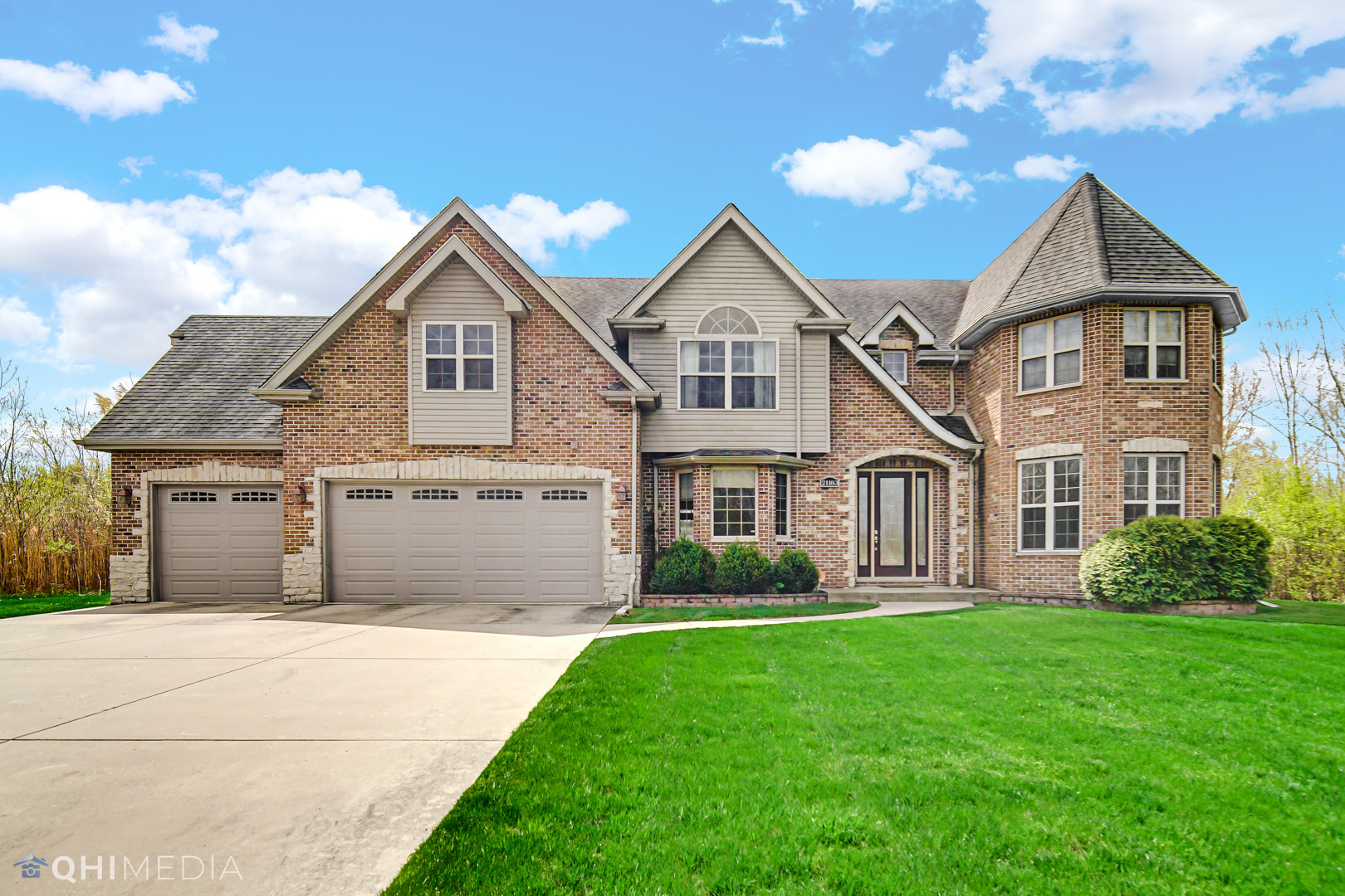 Undisclosed Address Steger, IL 60475 - Photo 1 of 29 a front view of a house with a garden and plants