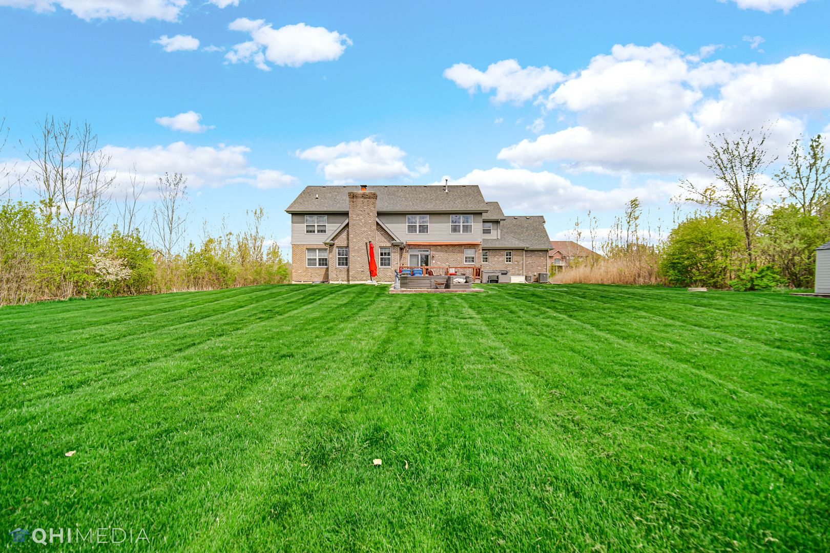 Undisclosed Address Steger, IL 60475 - Photo 28 of 29 a view of a house with a big yard and a fountain
