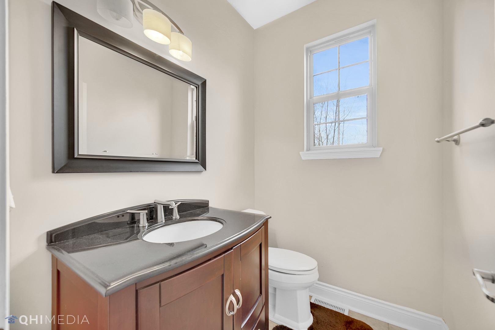 Undisclosed Address Steger, IL 60475 - Photo 8 of 29 a bathroom with a toilet sink and mirror