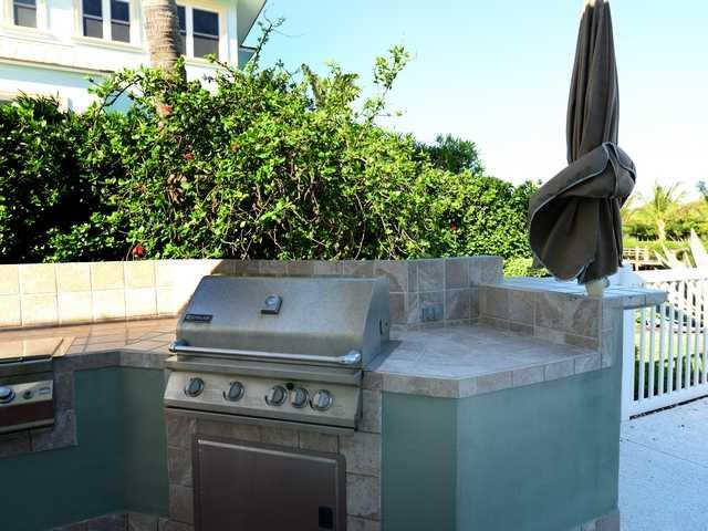 4259 Rigels Cove Way Jensen Beach, FL 34957 - Photo 12 of 22 a view of outdoor space kitchen and utility