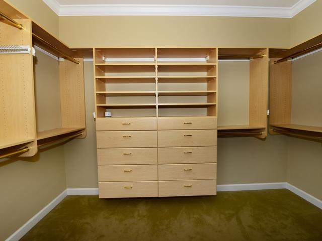4259 Rigels Cove Way Jensen Beach, FL 34957 - Photo 14 of 22 a view of walk in closet with empty racks