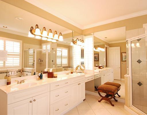 4259 Rigels Cove Way Jensen Beach, FL 34957 - Photo 9 of 22 a bathroom with a sink double vanity and a bathtub