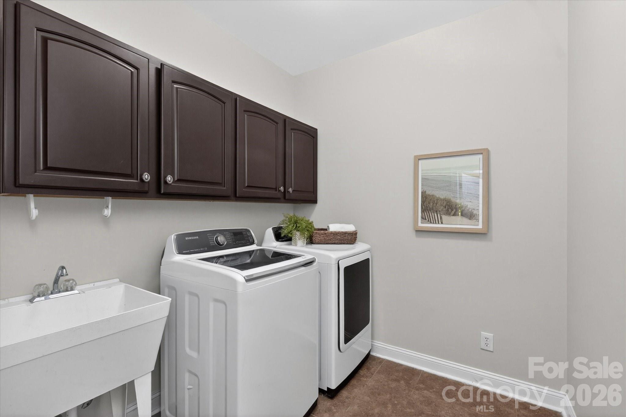 8528 Headford Road Charlotte, NC 28277 - Photo 16 of 34 a view of a storage & utility room with a sink