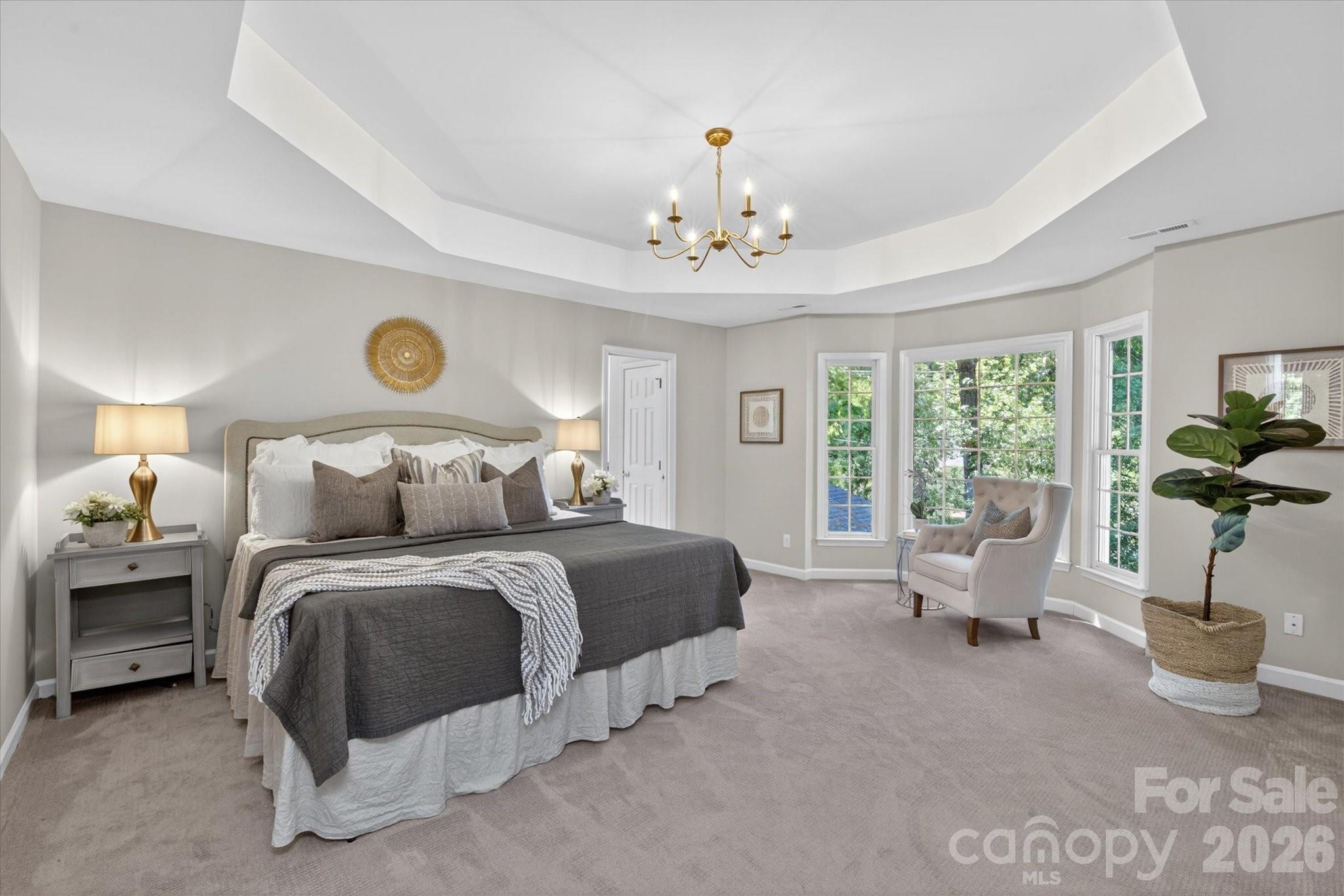 8528 Headford Road Charlotte, NC 28277 - Photo 18 of 34 a bed room with bed and window