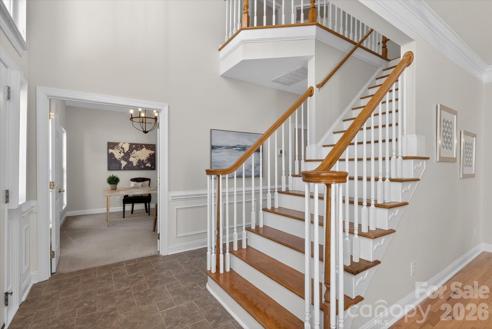 8528 Headford Road Charlotte, NC 28277 - Photo 2 of 34 a view of staircase with white walls and white walls