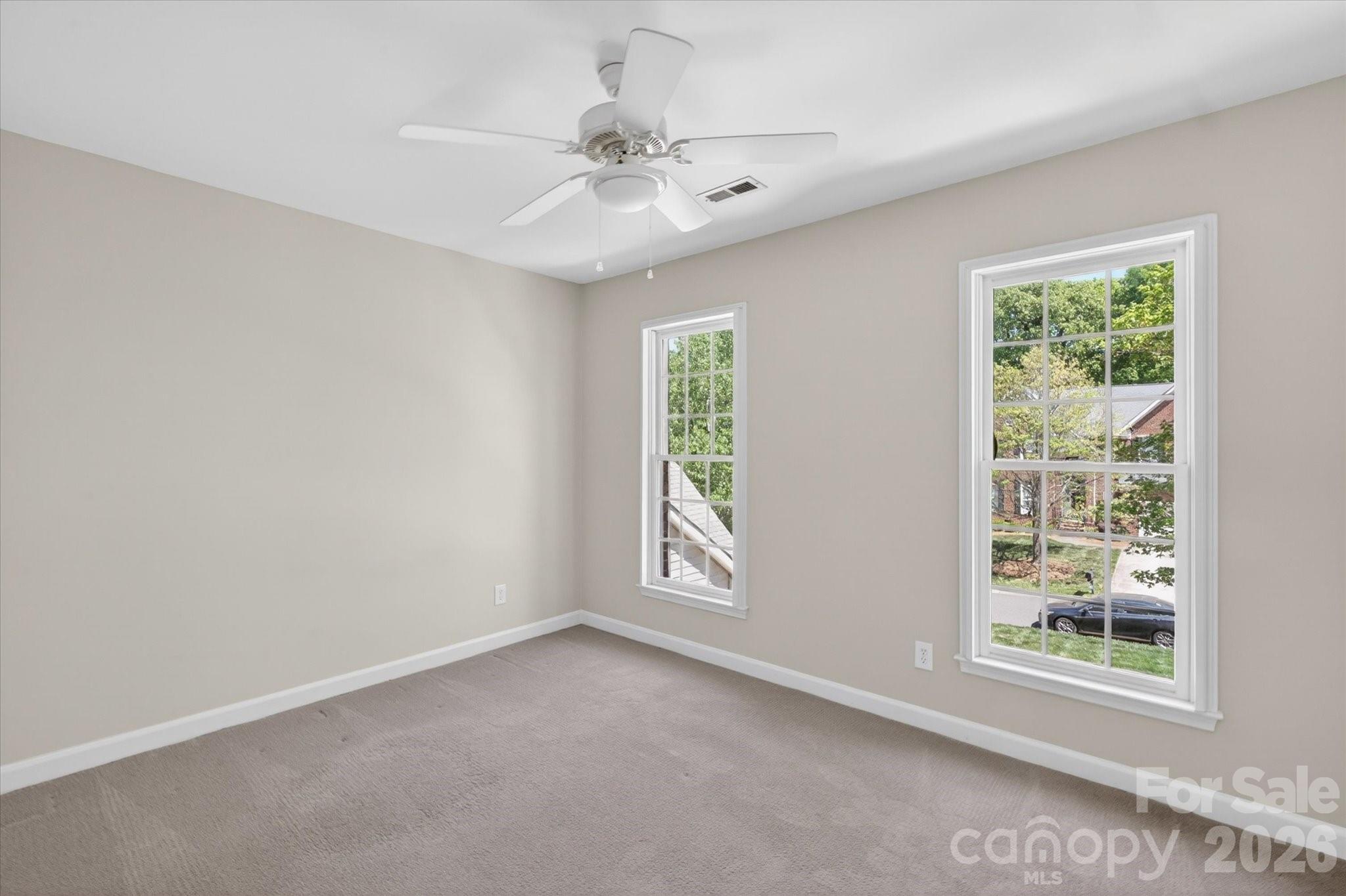 8528 Headford Road Charlotte, NC 28277 - Photo 26 of 34 an empty room with windows and closet