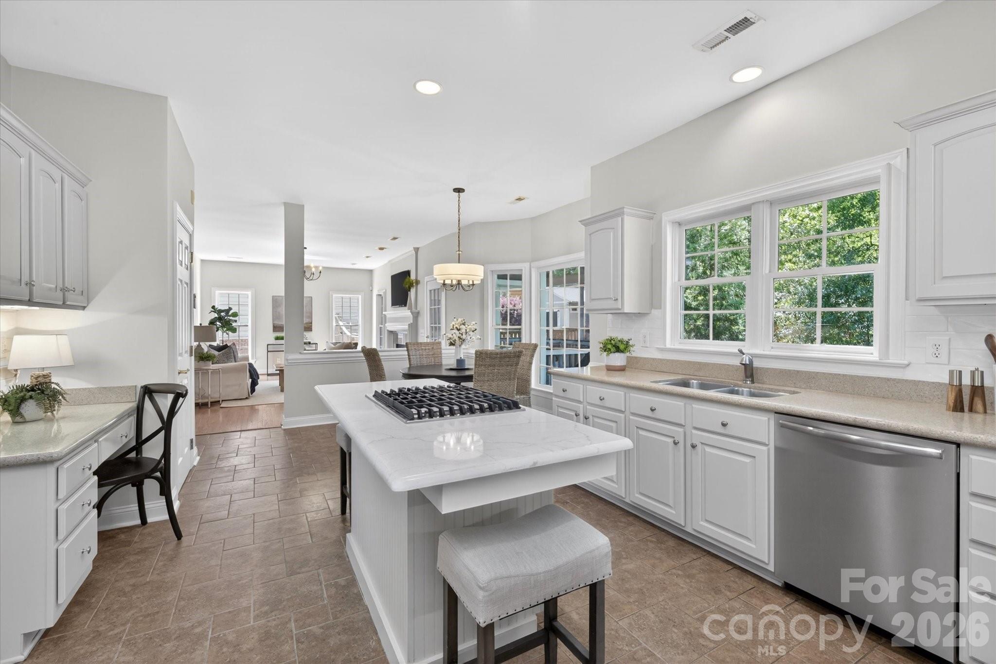 8528 Headford Road Charlotte, NC 28277 - Photo 7 of 34 a large kitchen with a table and chairs in it