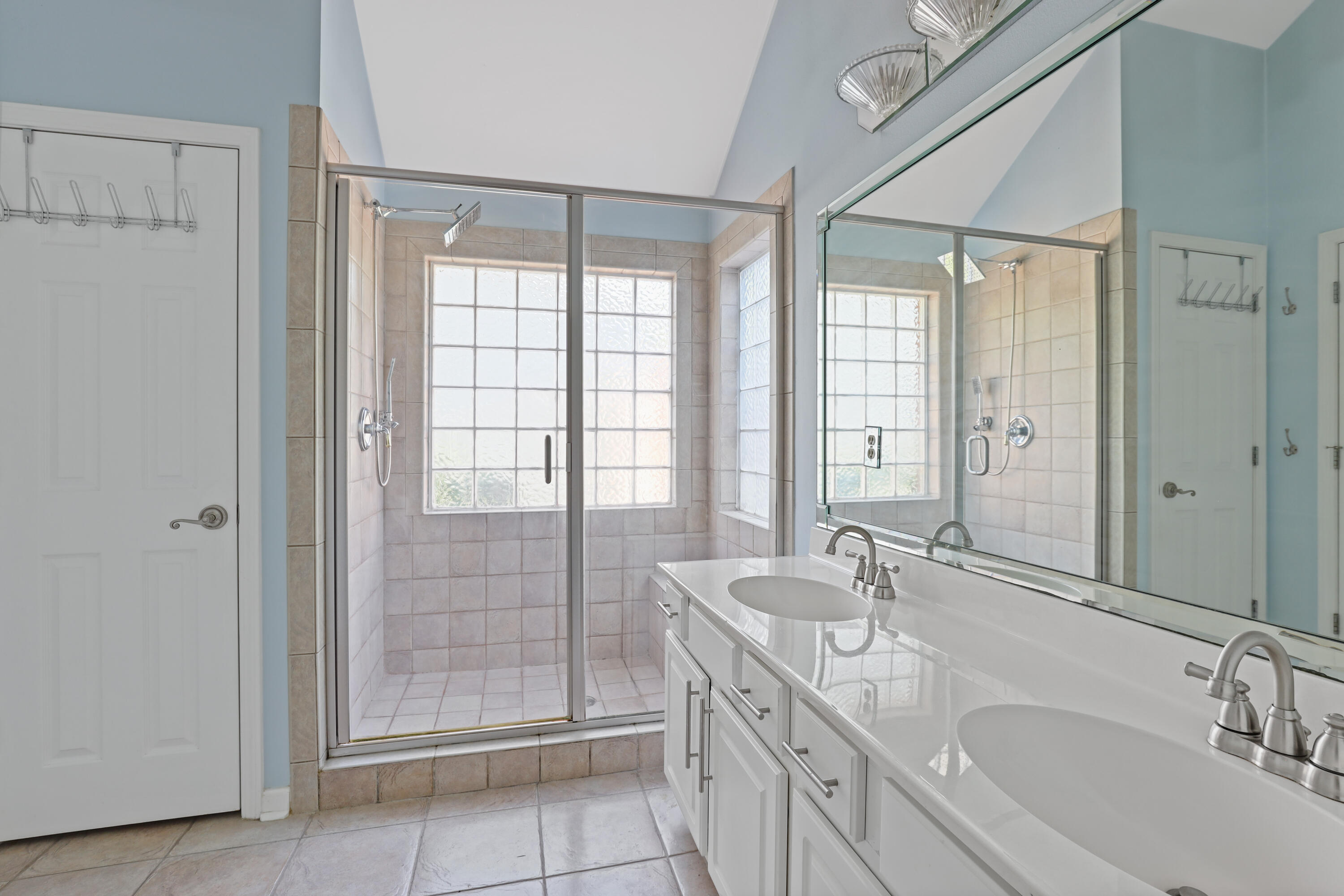 90 Hidden Lakes Drive Miramar Beach, FL 32550 - Photo 12 of 18 a bathroom with double vanity sinks and a shower