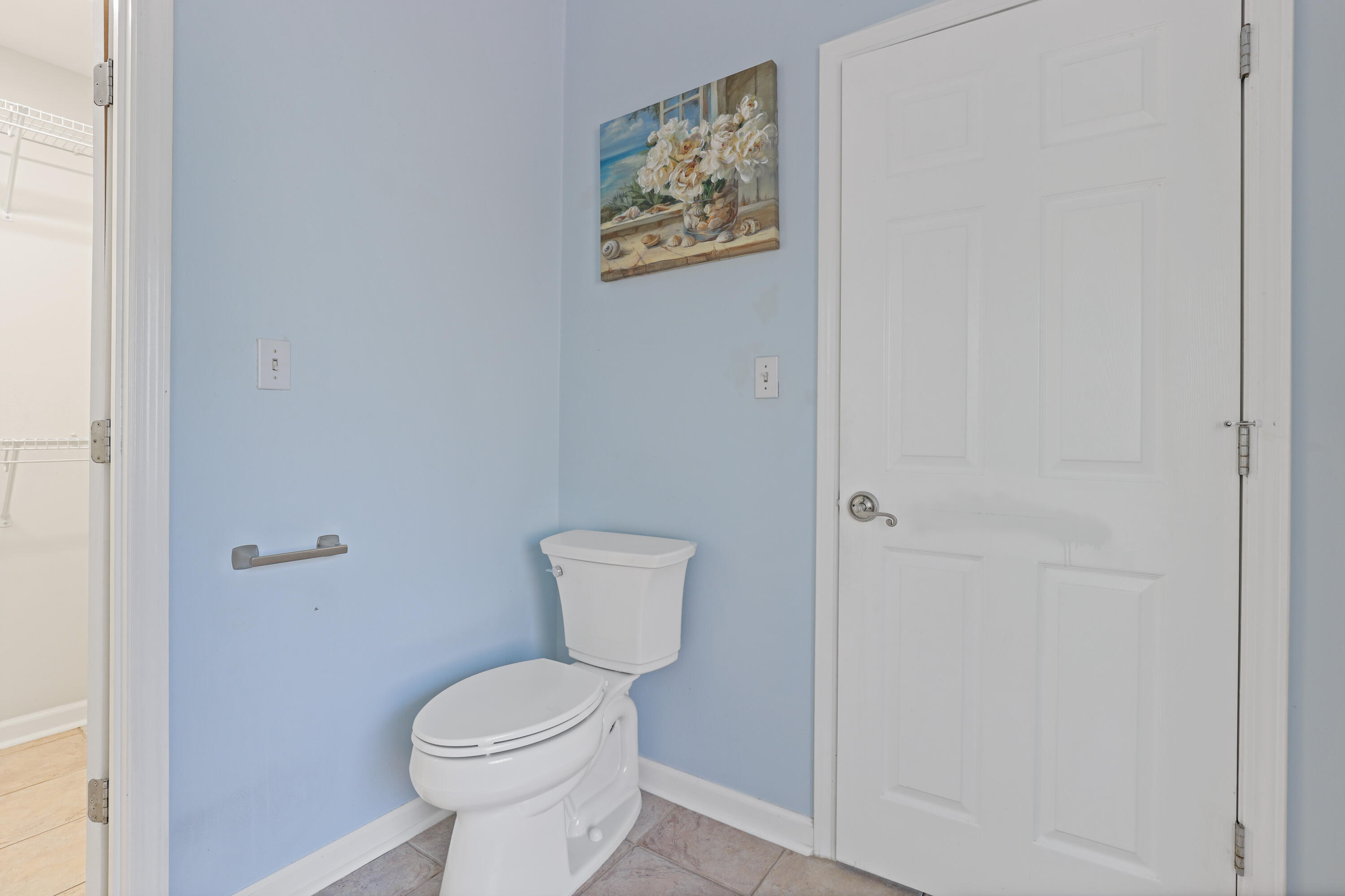 90 Hidden Lakes Drive Miramar Beach, FL 32550 - Photo 13 of 18 a white toilet sitting next to a white walls