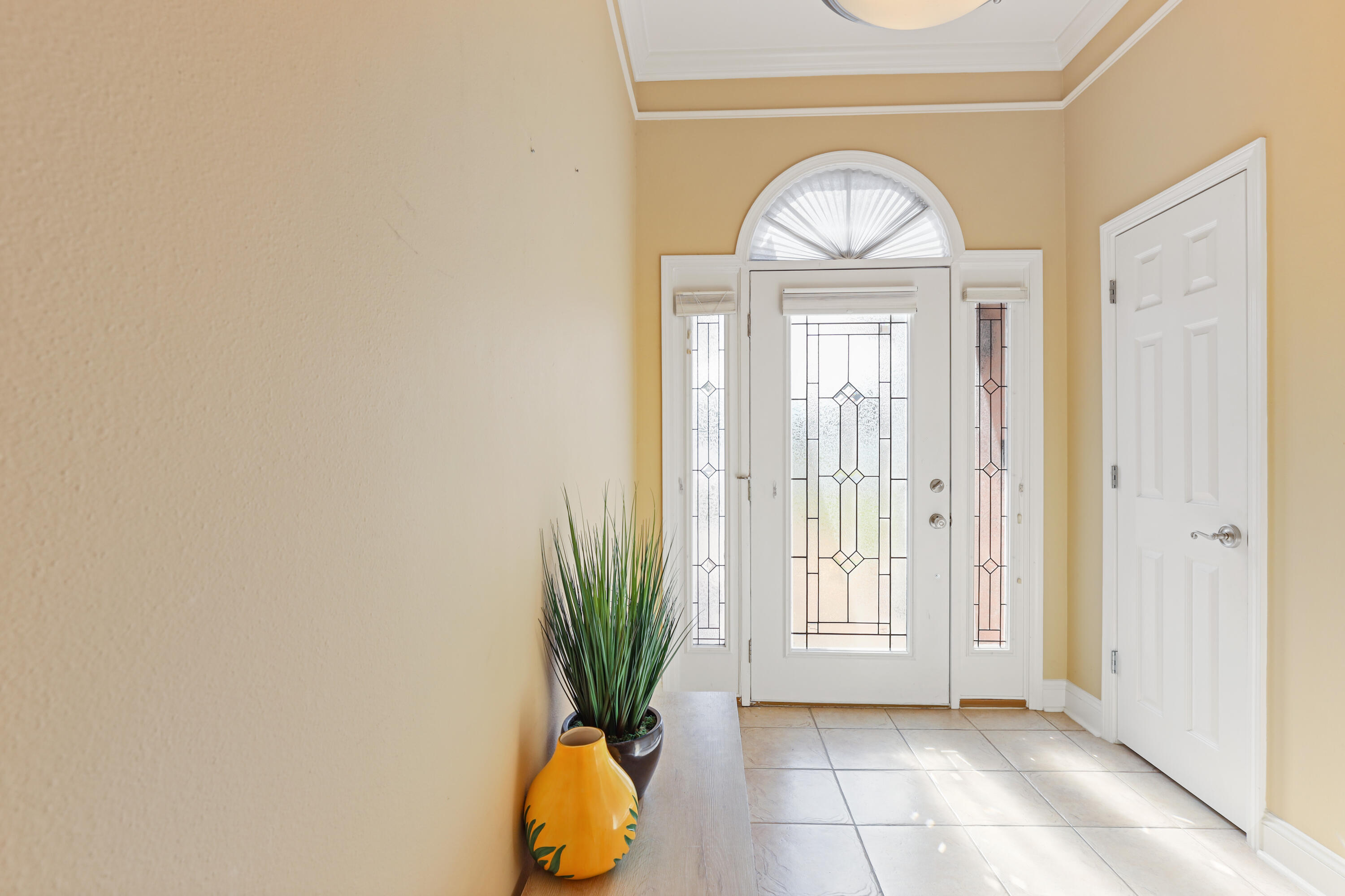 90 Hidden Lakes Drive Miramar Beach, FL 32550 - Photo 4 of 18 a view of empty room with garden view and a potted plant