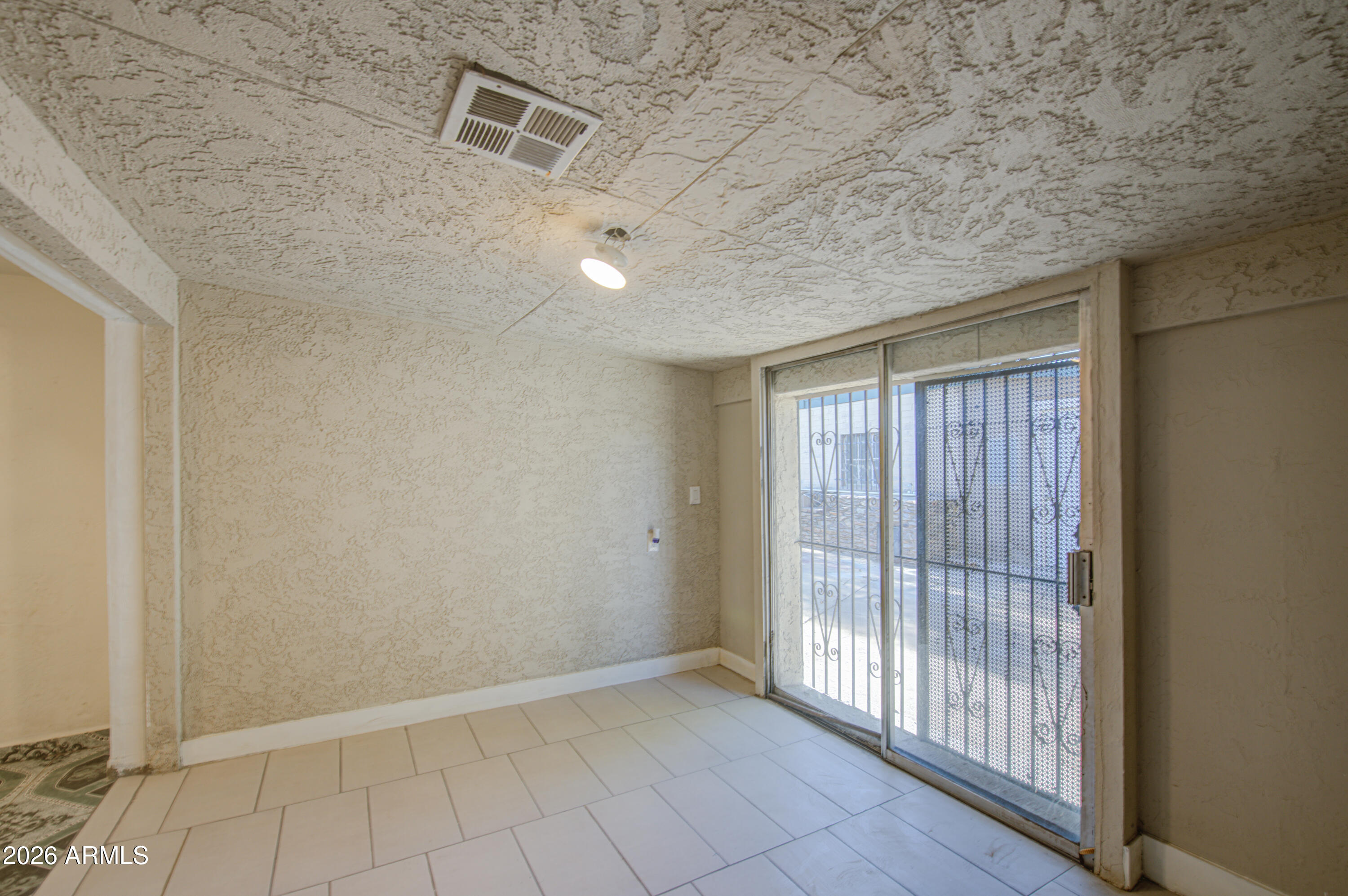 3204 West Monte Vista Road Phoenix, AZ 85009 - Photo 12 of 42 Family Room 1