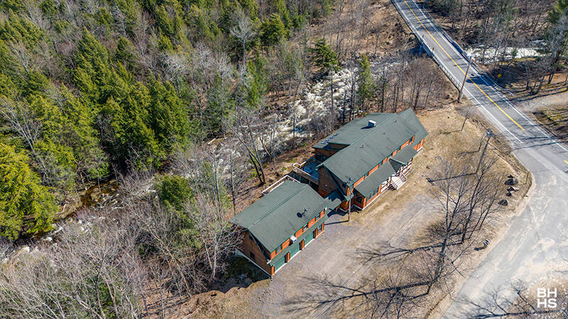 667 Days Mills Road St. Regis Falls, NY 12980 - Photo 2 of 51 HomeOnLakeOzoniaOutlet_A_Exterior_Front_