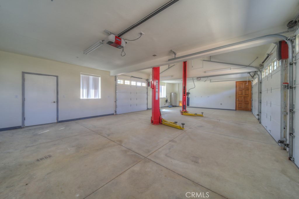 1991 Via Ladera Fallbrook, CA 92028 - Photo 44 of 69 Garage Lift - Drive through