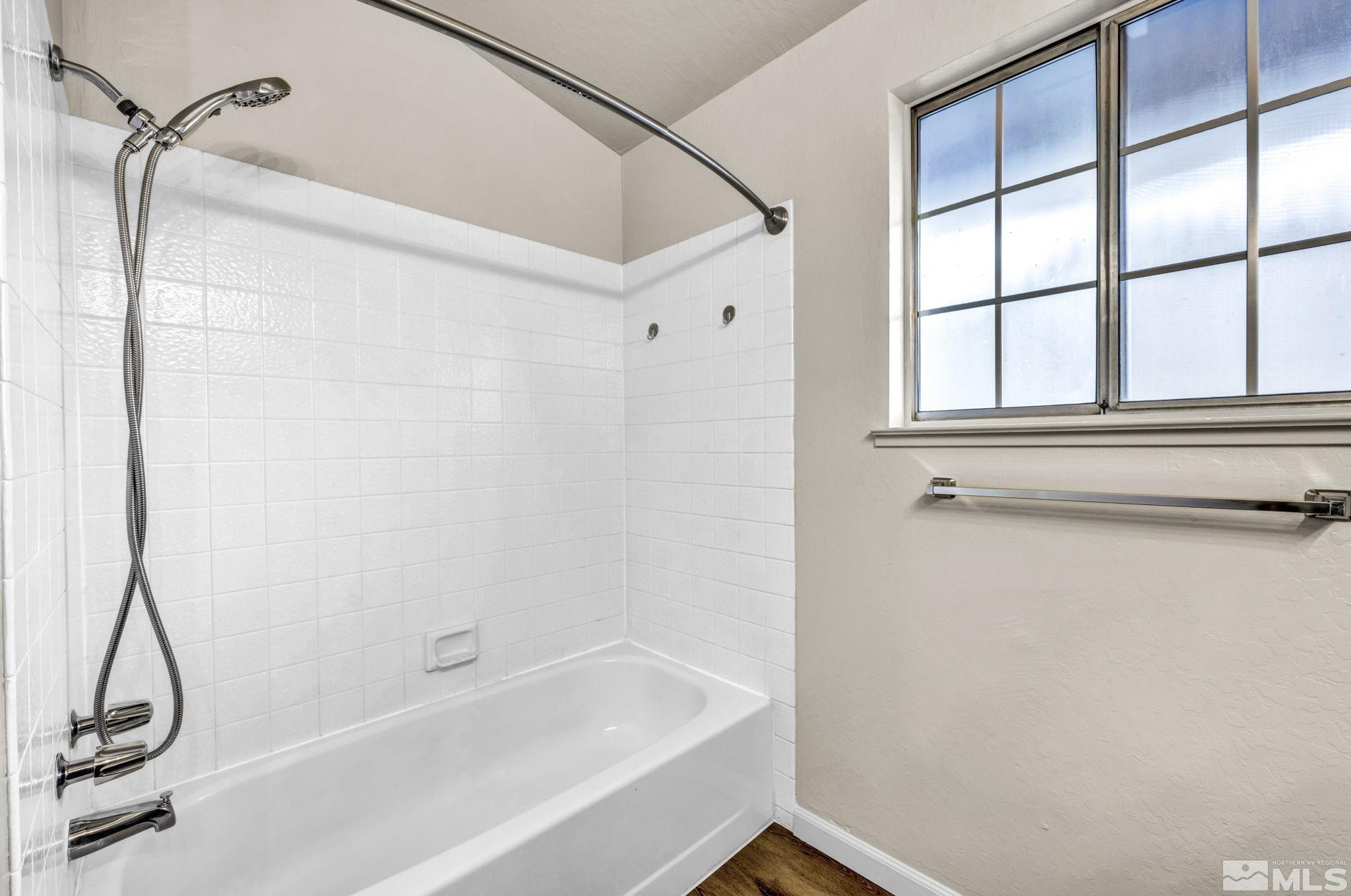 1300 Canyon Creek Road Reno, NV 89523 - Photo 26 of 29 a bathroom with a bathtub and a shower
