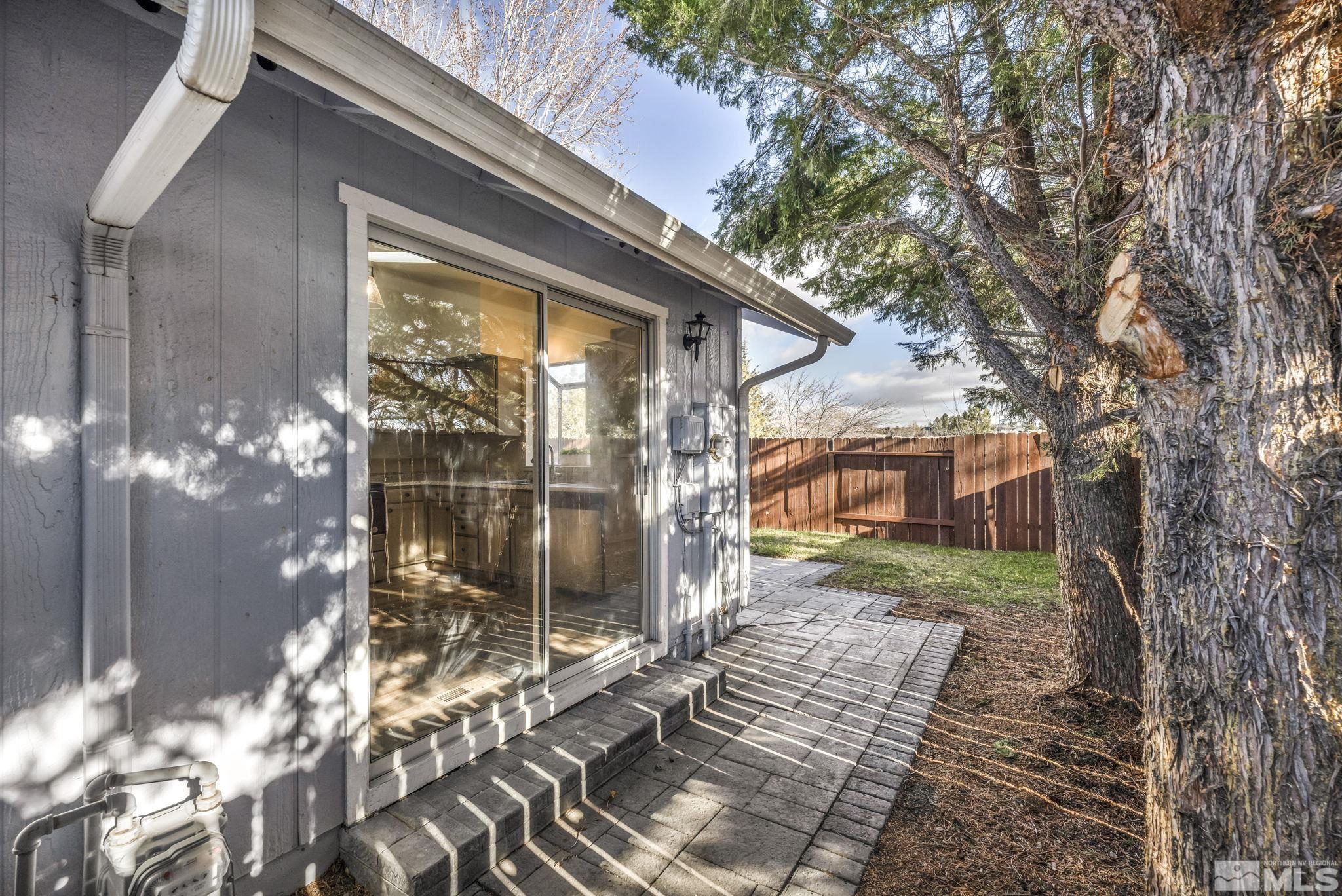 1300 Canyon Creek Road Reno, NV 89523 - Photo 7 of 29 a backyard of a house with table and chairs