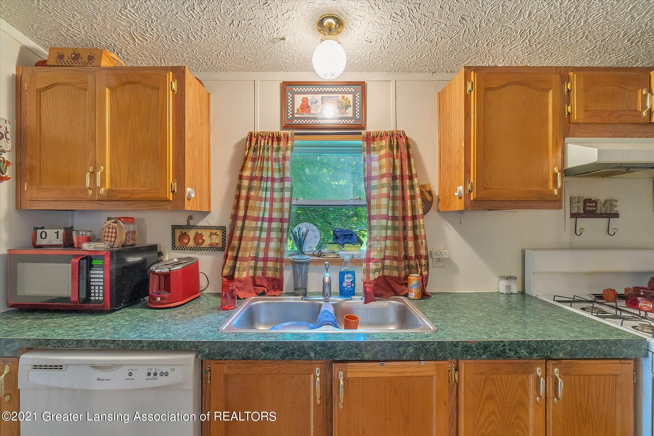 5416 Hughes Road Lansing, MI 48911 - Photo 11 of 24 11-5416 Hughes Rd-Windowstill Real Estat