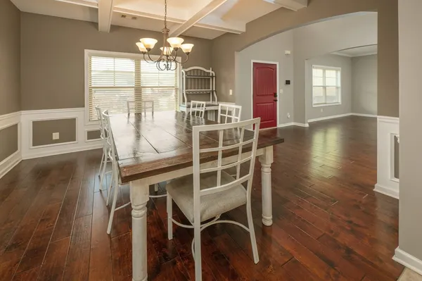 a view of an empty room with empty shelves