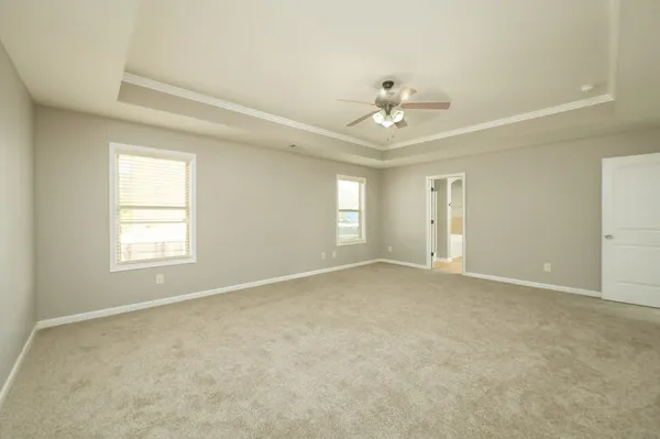 a view of storage and utility room with wooden floor