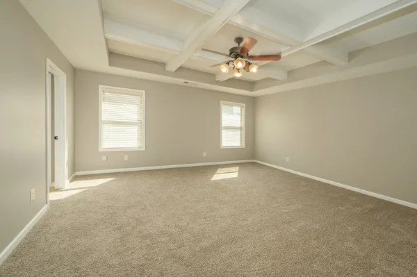 a view of an house with backyard porch and furniture