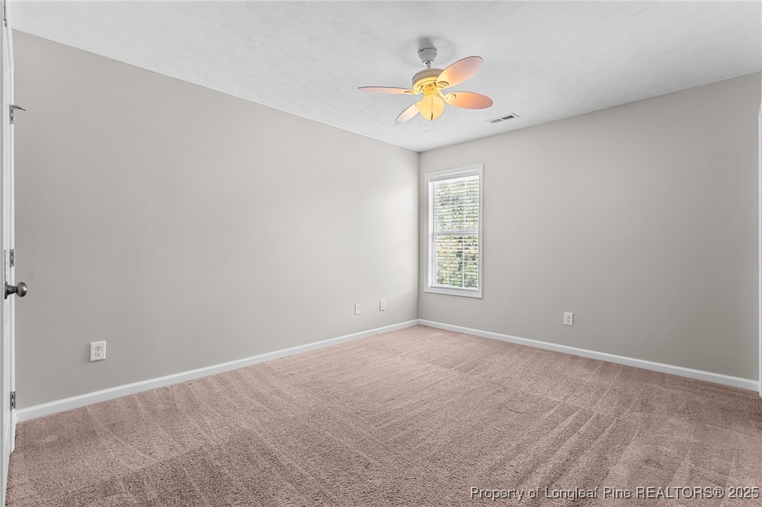 186 Scanner Court Raeford, NC 28376 - Photo 25 of 49 an empty room with a window