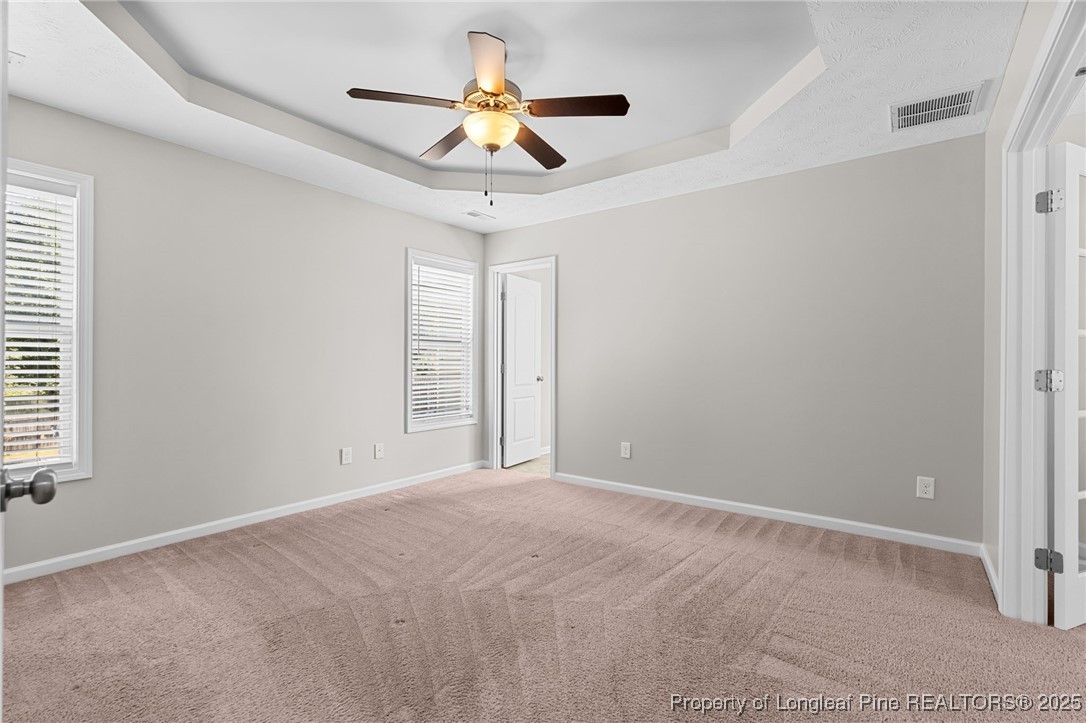 186 Scanner Court Raeford, NC 28376 - Photo 28 of 49 a view of a livingroom with a ceiling fan and window