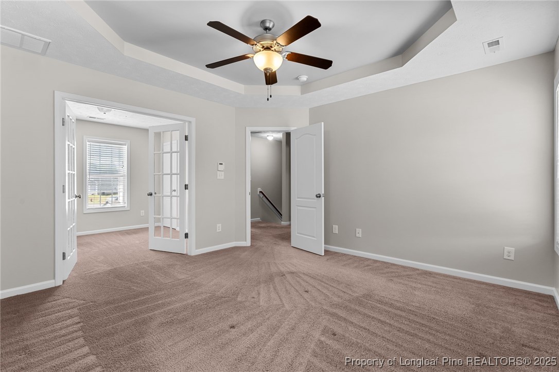 186 Scanner Court Raeford, NC 28376 - Photo 29 of 49 an empty room with fan and a ceiling fan