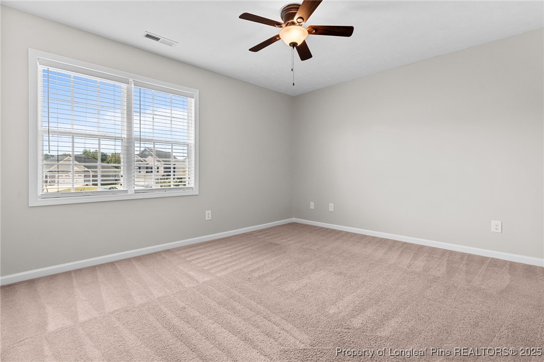 186 Scanner Court Raeford, NC 28376 - Photo 37 of 49 a view of an empty room with a window