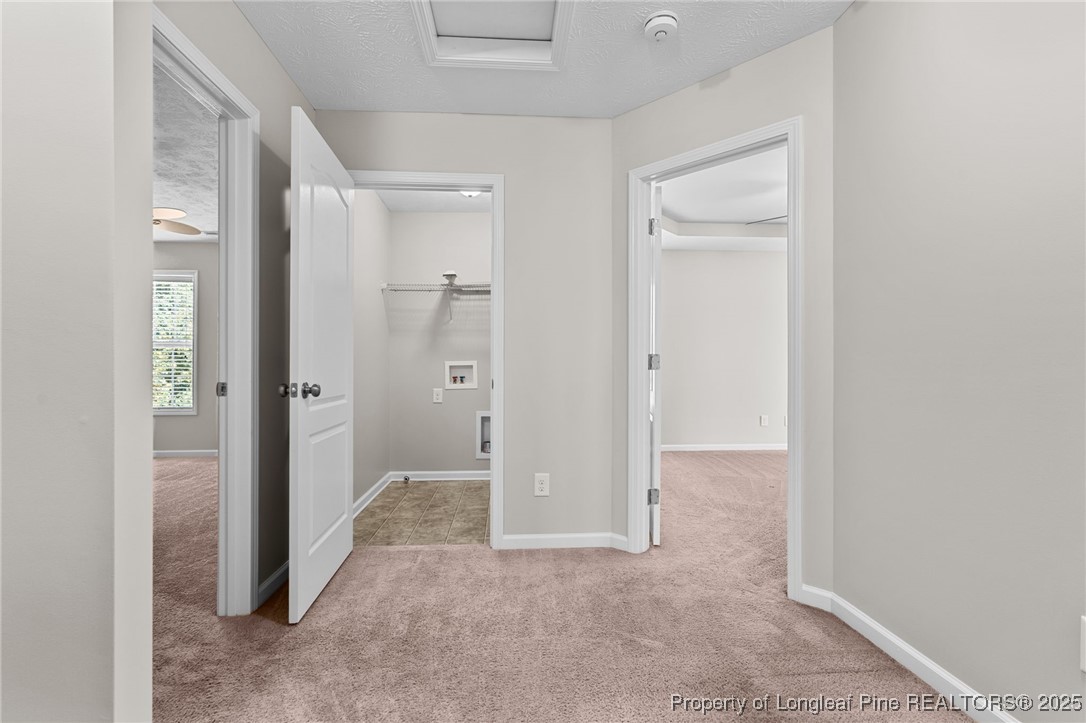 186 Scanner Court Raeford, NC 28376 - Photo 41 of 49 an empty room with closet and a bathroom