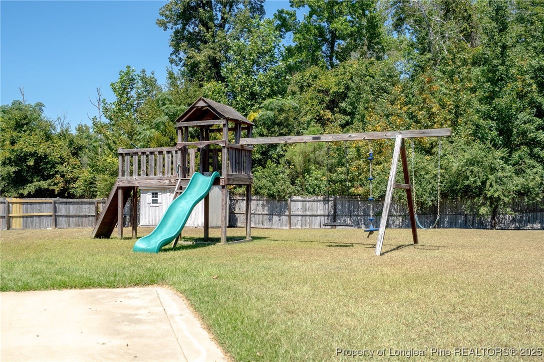 186 Scanner Court Raeford, NC 28376 - Photo 46 of 49 a view of a park with a slide
