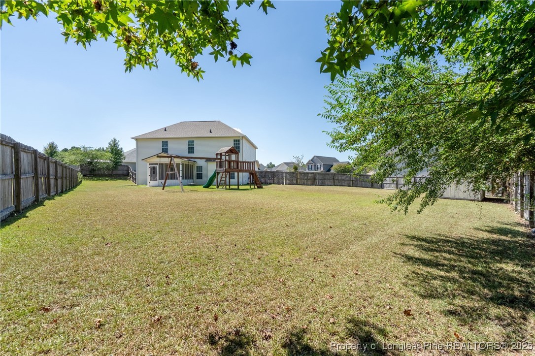 186 Scanner Court Raeford, NC 28376 - Photo 47 of 49 a view of a large body of water with a building in the background