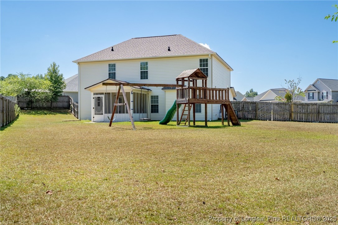 186 Scanner Court Raeford, NC 28376 - Photo 48 of 49 a view of a house with roof deck