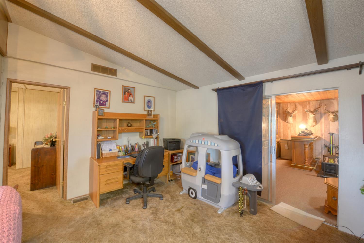 1471 Highway 33 Gustine, CA 95322 - Photo 45 of 57 a bedroom with furniture and a window