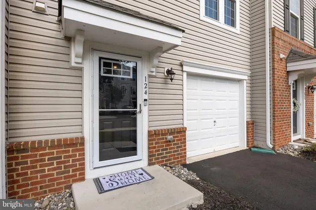 a view of a door and a window
