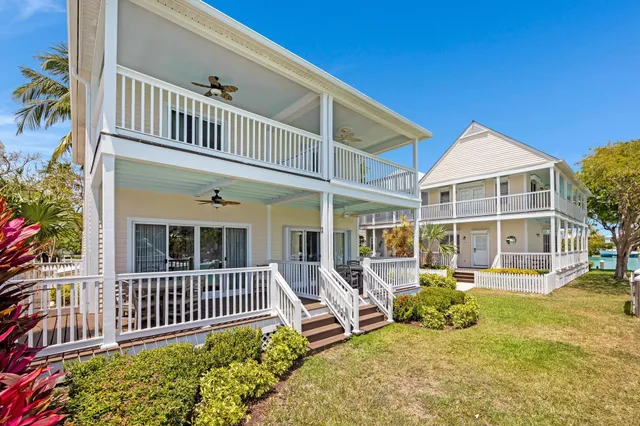 a kitchen with cabinets and white appliances