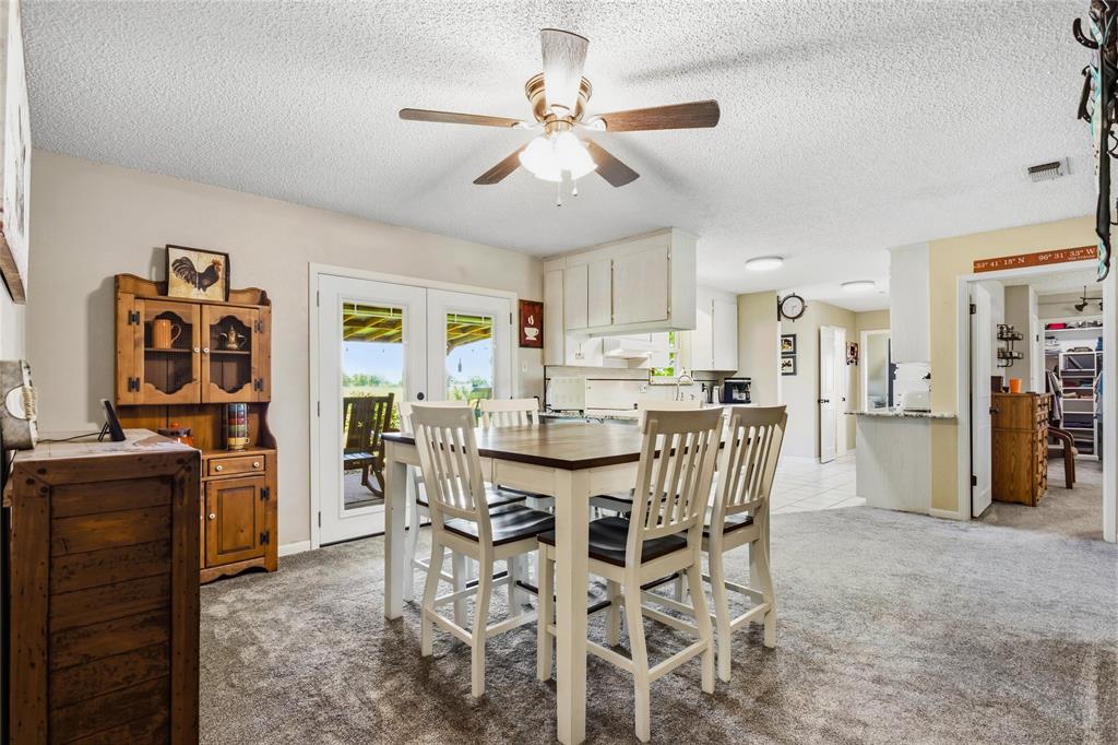 235 Magnus Road Denison, TX 75021 - Photo 22 of 35 a view of a dining room with furniture
