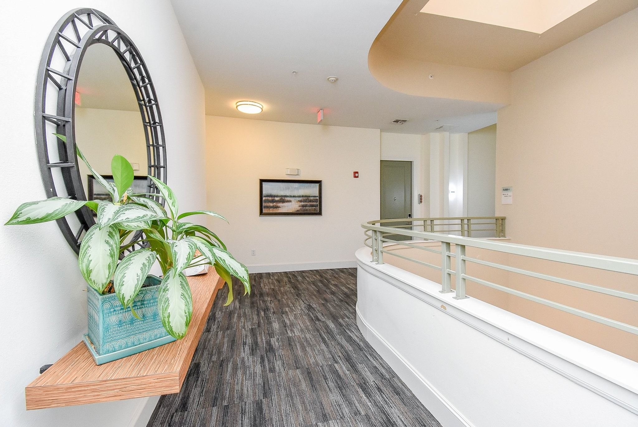 300 St Joseph Parkway, Unit 421 Houston, TX 77002 - Photo 12 of 32 a spacious bathroom with a granite countertop tub a mirror and a shower