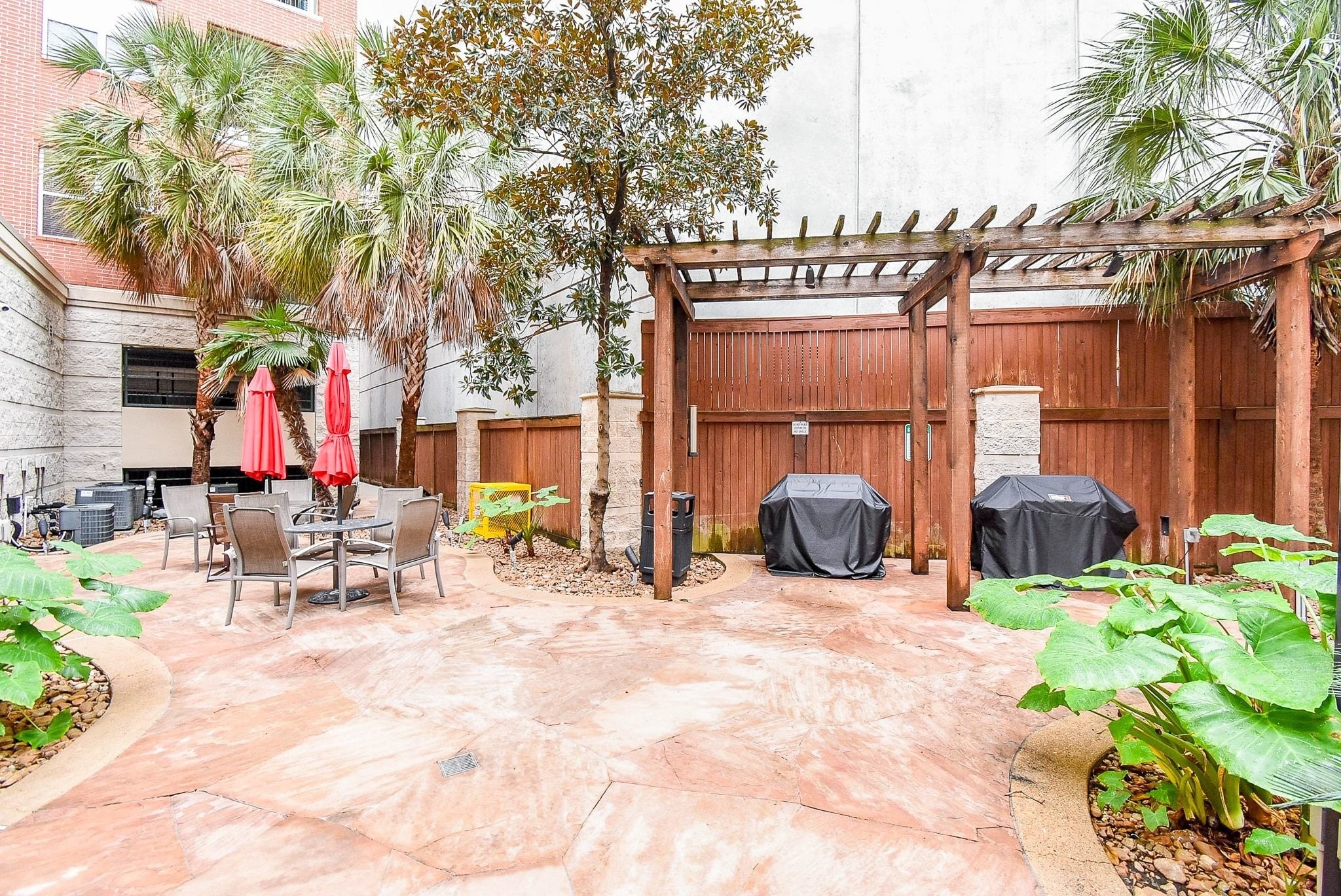 300 St Joseph Parkway, Unit 421 Houston, TX 77002 - Photo 6 of 32 a view of swimming pool with outdoor seating and a patio