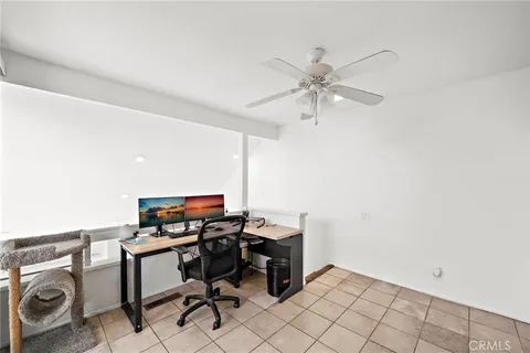 a view of workspace with wooden floor