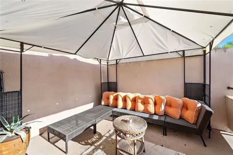 a blue bench sitting on top of a roof