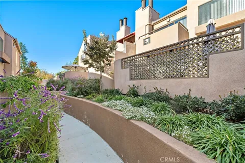 a view of a swimming pool with chairs