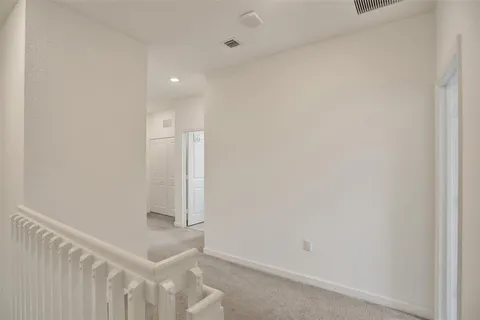 a bathroom with a double vanity sink toilet and shower