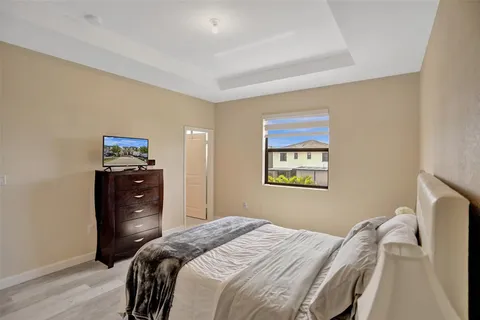 front view of a building with a garden