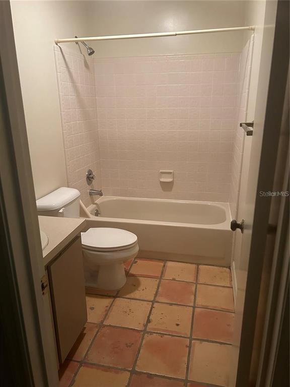 5115 Southwest 92nd Court Gainesville, FL 32608 - Photo 15 of 15 a bathroom with a toilet and a shower