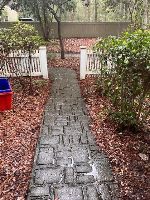 5115 Southwest 92nd Court Gainesville, FL 32608 - Photo 2 of 15 a view of a yard with plants