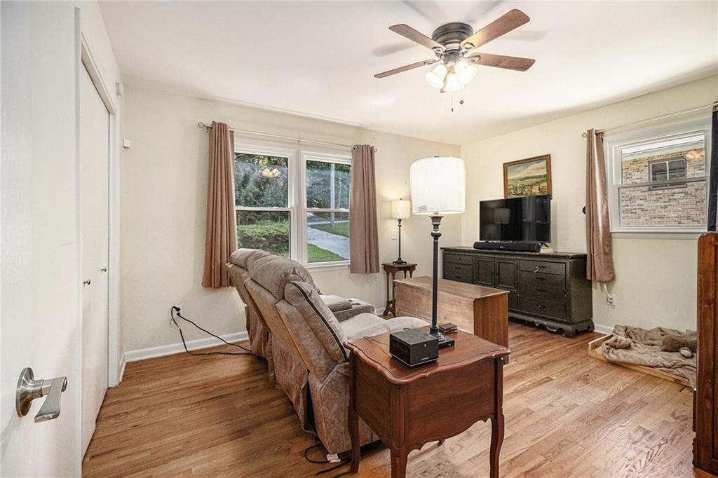 2545 Rockbridge Road Northwest Conyers, GA 30012 - Photo 28 of 61 a view of a dining room with furniture window and wooden floor