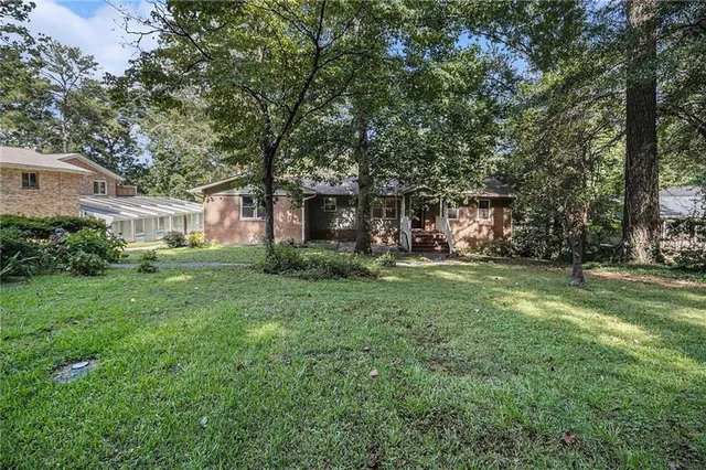 a front view of house with garden