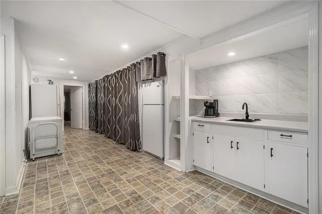 a bedroom with bed and a window