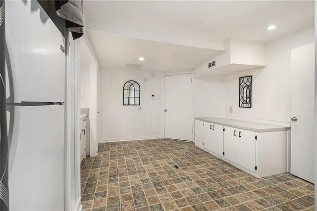 a view of a park with large trees