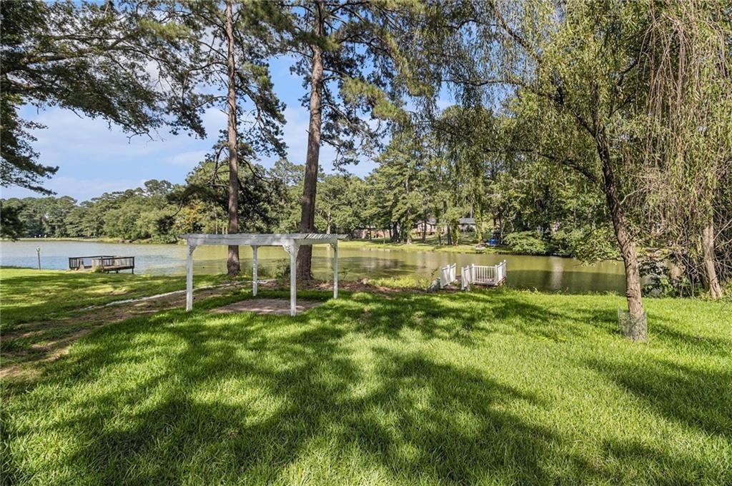2545 Rockbridge Road Northwest Conyers, GA 30012 - Photo 48 of 61 a view of a park with large trees