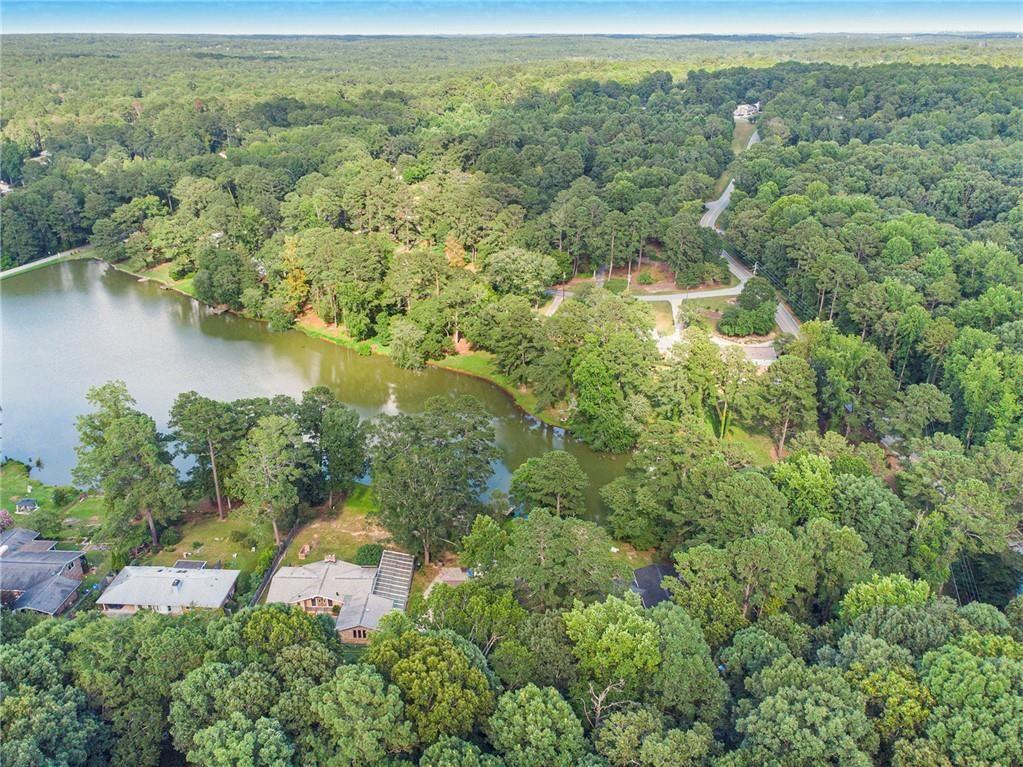2545 Rockbridge Road Northwest Conyers, GA 30012 - Photo 53 of 61 an aerial view of residential houses with outdoor space and trees